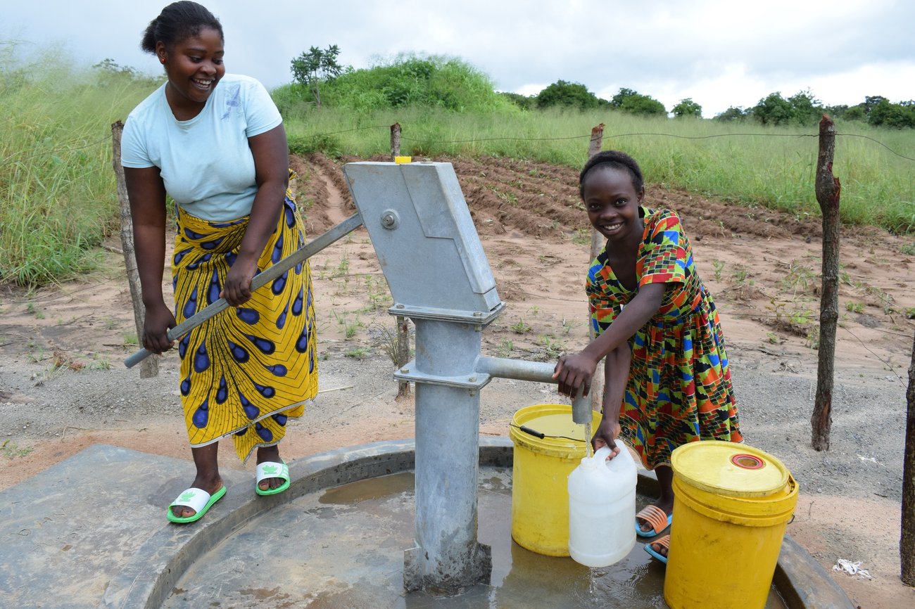 Loveness and her family now have access to safe and clean water from a nearby borehle drilled by World Vision in their family (003)