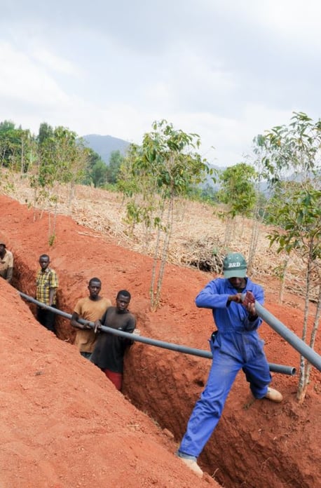 Men Connecting Pipeline in Africa 2