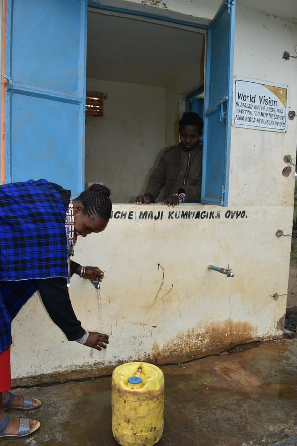 Naomi collecting clean water