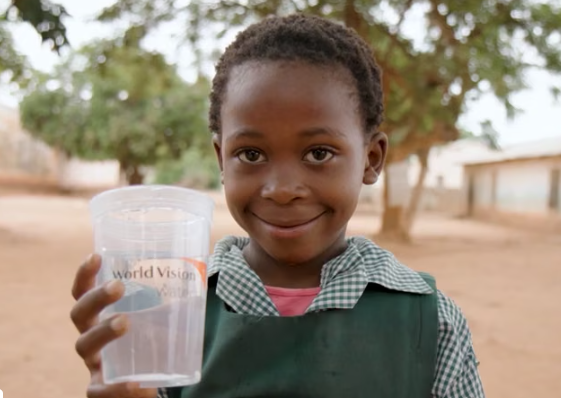 Zambia girl with cup