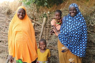 Asmaou with her big sister and children