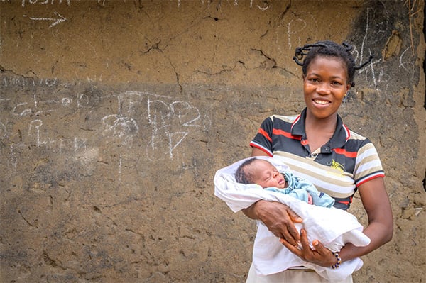 mother holding baby