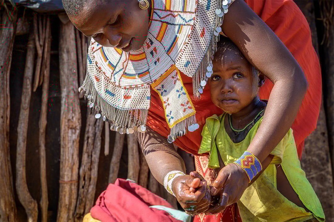 Naidimu, married at 14, is pictured with her youngest child.