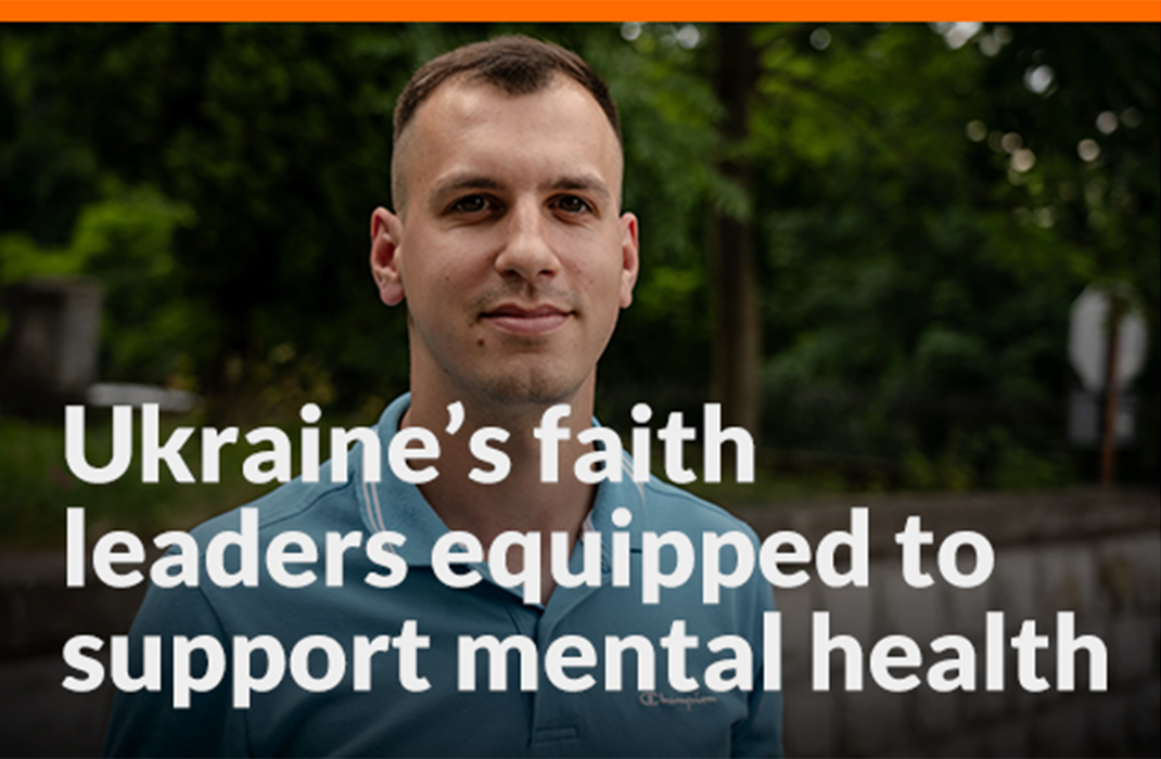 A man standing outside wearing a blue collared shirt smiles for the camera. Text on image reads: Ukraine’s faith leaders equipped to support mental health.