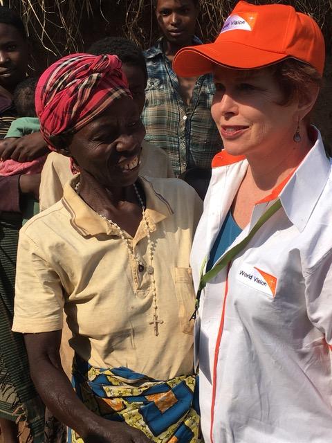 Robin connecting with a mother in Rwanda