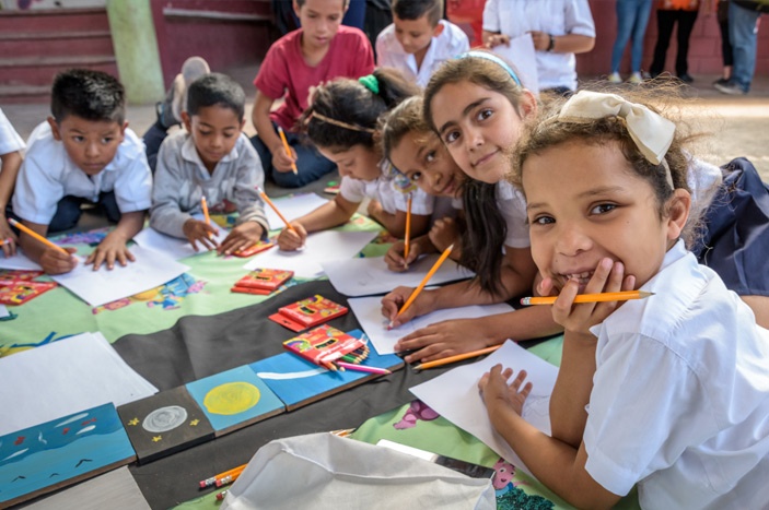 School children take part in a lesson from the “Raising Children with Tenderness” curriculum, in Cerro de Plata ADP, Tegucigalpa, Honduras. 