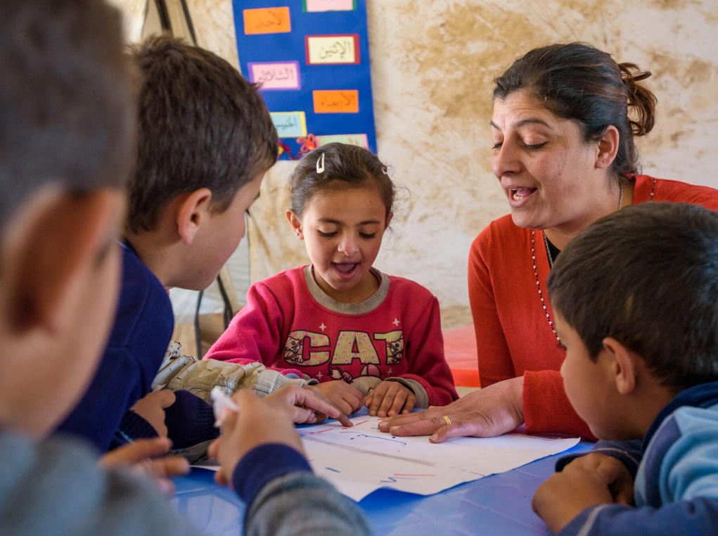 World Vision Early Childhood Education (ECE) Supervisor Thanaa supervises teaching of Syrian refugee children at an Early Childhood Education program.